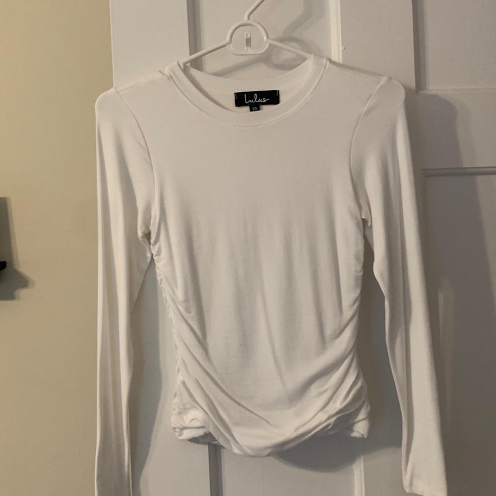White long sleeve top with ruched sides, your best of LuLus!